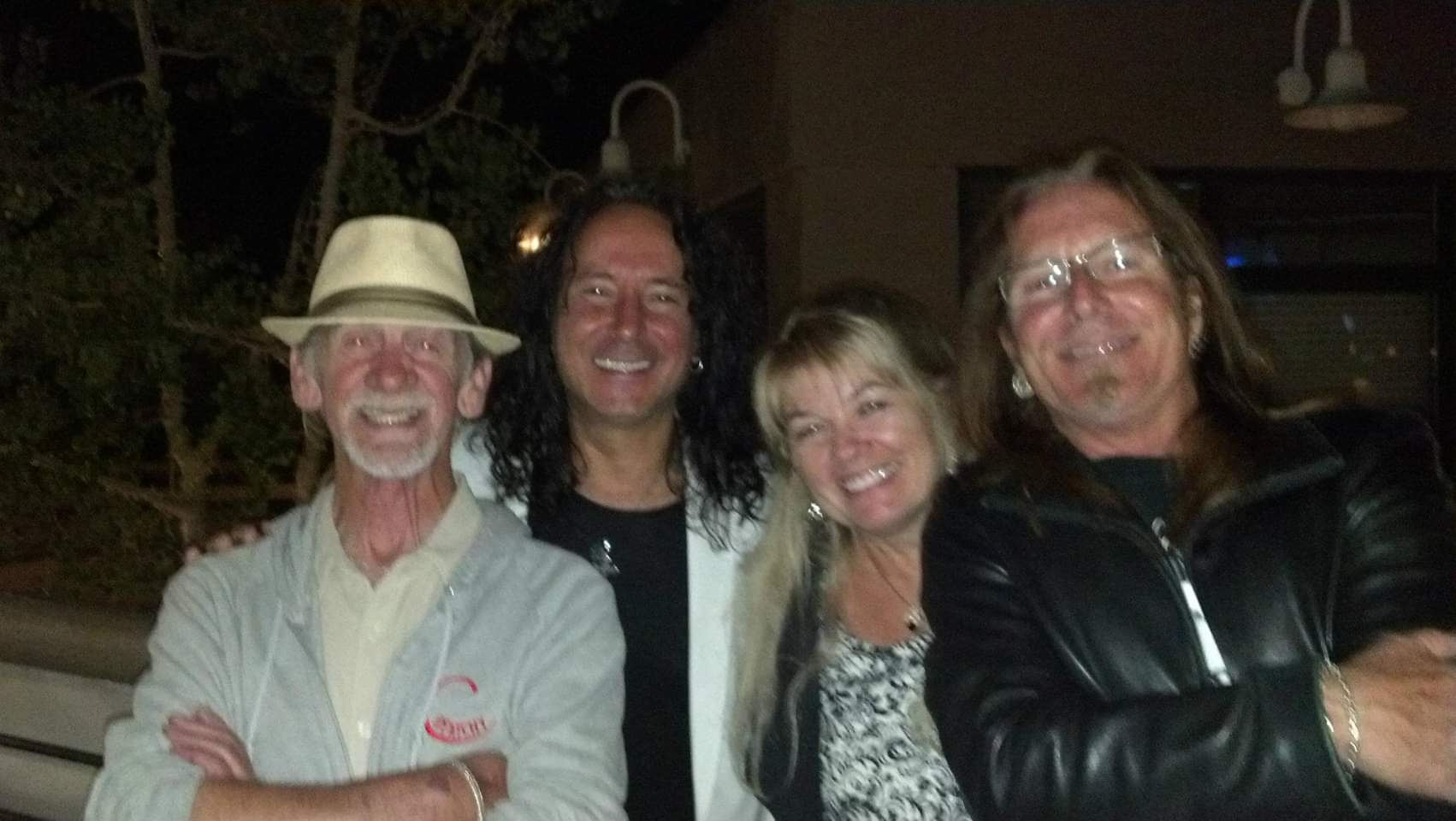 Alex Ligertwood, Steve Augert, Lydia Dunaway and Barry Dunaway outside at night